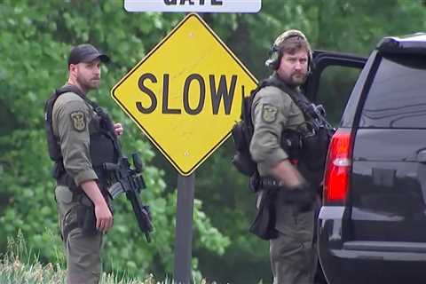 An armed man is wounded in an exchange with an F.B.I. agent outside the C.I.A.’s headquarters in..