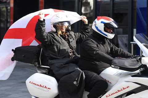 Kate Garraway waves England flag on motorbike around London because it’s coming home