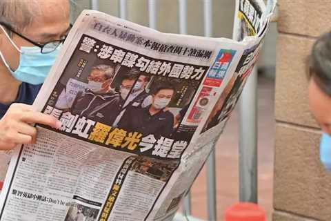 Hong Kong pro-democracy paper unable to pay staff after asset freeze: aide