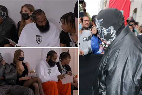 Kanye West watching a whole fashion show through a full-head mask is a big social-distancing mood