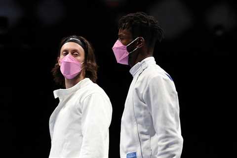 U.S. fencers wear pink masks to protest against teammate accused of sexual misconduct.