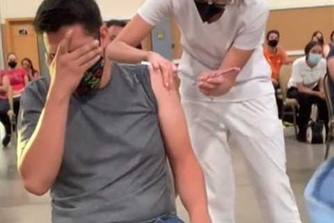 Courageous Hero Student Takes Covid Vaccination in The Arm in Hilarious Vid