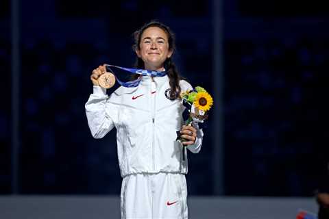 Molly Seidel ran her third marathon, got bronze, and was honored at the closing ceremony.