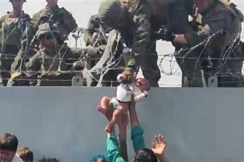 According to the military, a baby who crossed a Kabul wall was reunited with his family.