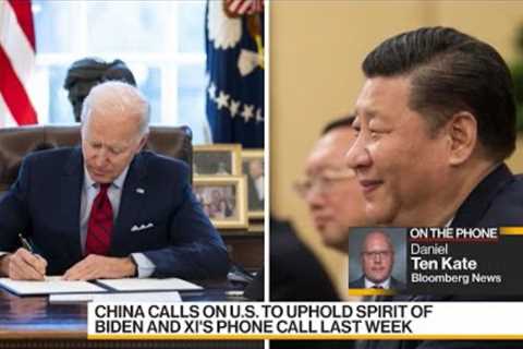 China urges the United States to mend ties as Biden weighs trade probe