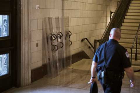 Biden will address a small audience in a locked-down Capitol