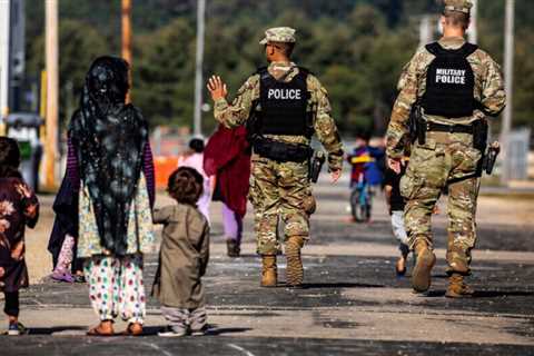 As Afghans wait months for homes in the U.S., Military Bases are transformed into small cities.