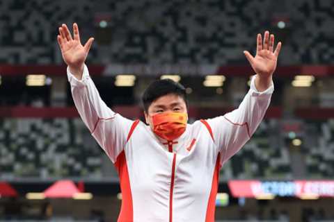 An outraged Chinese gold medalist was confronted about her "masculine appearance" by a reporter.