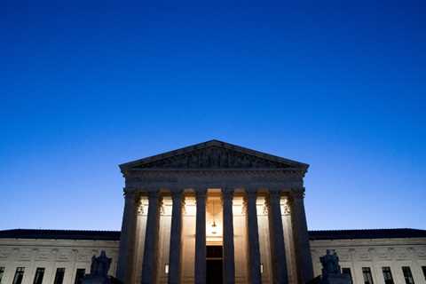 One justice missing and only one masked: the Supreme Court returns