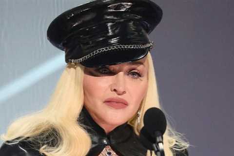 Madonna Blamed by Critics for Her Hairstyle, A Knife to Her Throat and Unpaid Labor