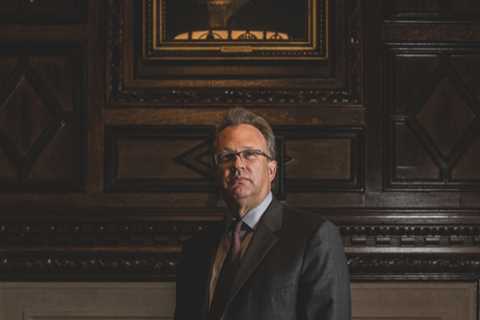 Un top official says the Fed will 'Grapple’ with a faster bond-buying taper