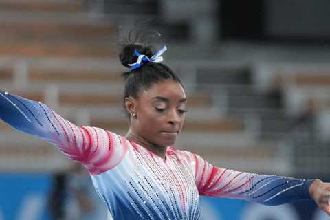 Watch Biles' beam routine in action.