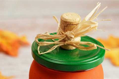 Make a DIY Halloween Mason Jar. Paint your Mason Jar to make a Halloween Pumpkin.