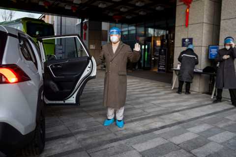 Beijing's Olympic Bubble: Robots and Swabs, and a Big Gamble