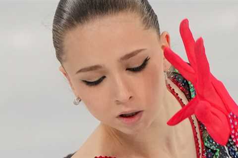 Russia wins team figure skating gold as Kamila Valieva scores two quad jumps.