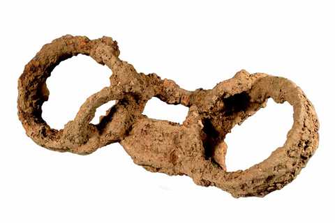 Roman Slave of Britannia, Shackled, And Thrown In A Ditch To Die