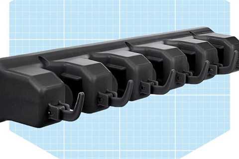 This Mop and Broom Holder Instantly Declutters Your Cleaning Closet or Garage