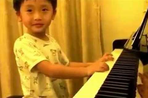 4 Year Old Boy Plays Piano Better Than Any Master
