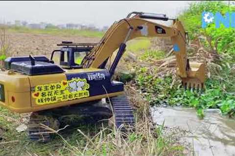 Strong Huina 336D RC Excavator Clearing Water Cannel PNM RC part 3