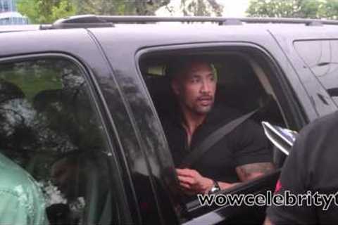Dwayne 'The Rock' Johnson signs autographs at tv show