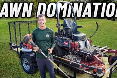 Lawn Care Equipment Setup with Zero Turn Mower, String Trimmers and Backpack Blower on a Trailer