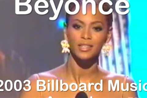 Beyoncé at the 2003 Billboard Music Awards (winning 4 awards) -- DMC and Tommy Lee present