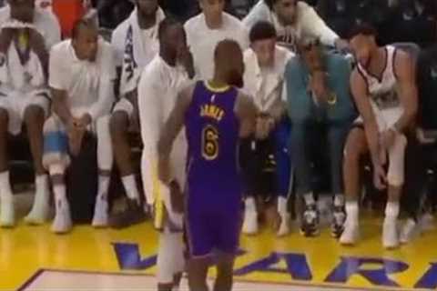 LeBron James and Draymond Green chatting it up mid game while Andre Iguodala.. 😂