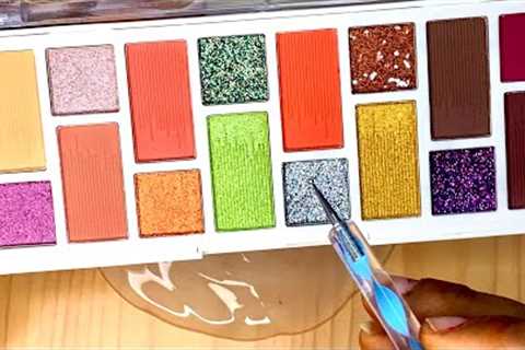 Slime coloring with makeup! Mixing nail polish eyeshadow glitter into white glossy slime! #slimeasmr