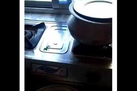 before duty police man cooking tasty &amp; healthy chicken curry,rice, green salad