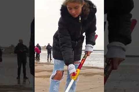Volunteers Draw Giant Poppies On Beach Ahead of Remembrance Day