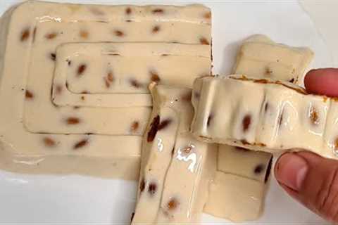 Mix egg white with sugar and almonds! You will be overwhelmed with this recipe! Very easy Nougat!