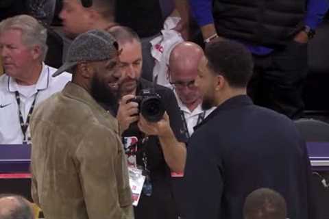 Lebron James and Ben Simmons have a laugh after the Lakers win vs Nets