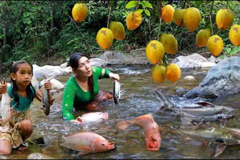Mother with daughter pick eggfruit and catch many fish by waterfall - Roasted fish chili for lunch