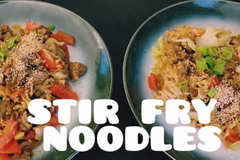 Cooking stir fry noodles with farmer's sausage, black bean paste, pointed cabbage and bell pepper
