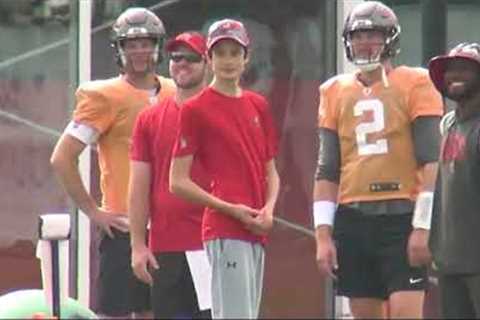 Tom Brady has a moment with his son Jack Brady at Buccaneers' practice