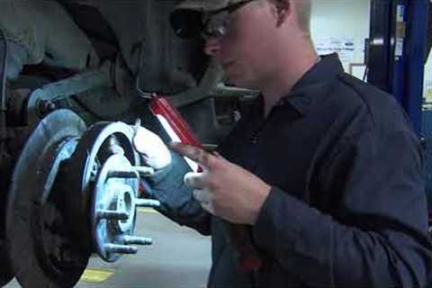 Training for an automotive technician career in high school