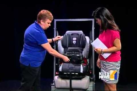Child Passenger Safety Technician shows proper way to set up car seats