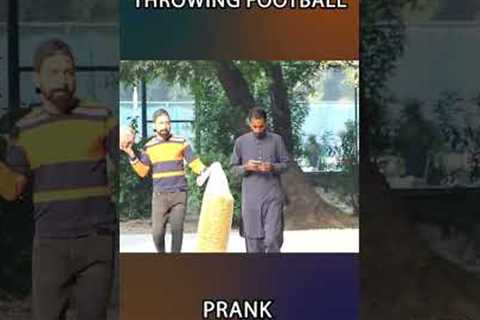 Throwing football prank #shorts #shortvideo #trending #funny