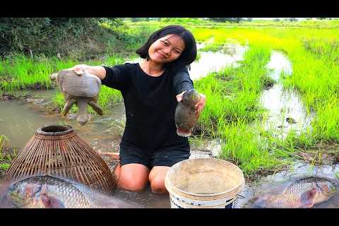 Girl catch fish with smart dogs