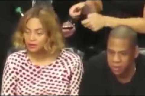 Caption this: Is Beyonce okay? She seems upset at Jay Z during a Basketball game.