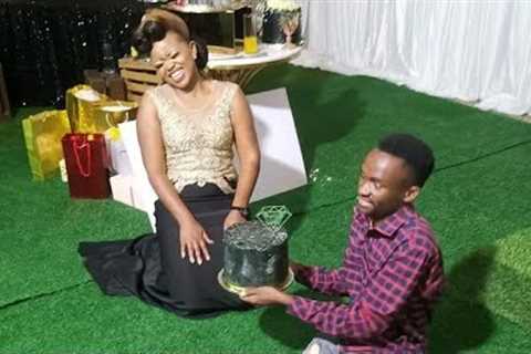 Mwizukanji gifts Logic with a cake on her 30th Birthday