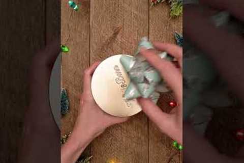 Make your own diy gift bows! Reuse wrapping paper, or use up too-small paper scraps!