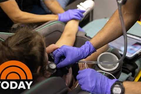 US Reaches 100M COVID-19 Cases As Hospitals Battle ‘Tripledemic’