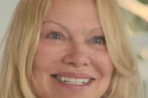 Bare-Faced Pamela Anderson Seemingly Reacts to 'Pam &amp; Tommy' In Netflix Doc Trailer