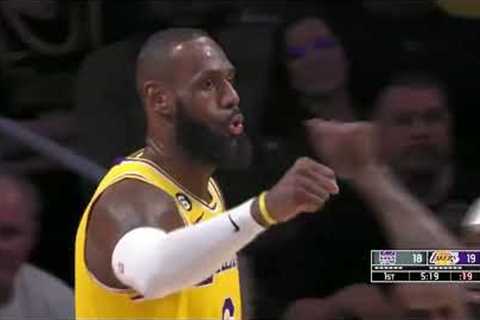 LeBron James shocks the whole arena with a fast break dunk after blocking Harrison Barnes in paint