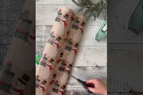 Make a gift bag from wrapping paper! It’s actually easy to do. #giftwrappingideas #giftideas