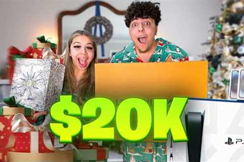 Opening $20,000 Worth Of Christmas Presents!! *CAN’T BELIEVE SHE GOT ME THIS*