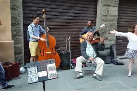 Street Performers Vibing with a Tourist Contrabass Player
