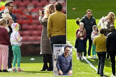 Hollywood stars Ryan Reynolds and Blake Lively pose for snaps with newborn baby and their three da..