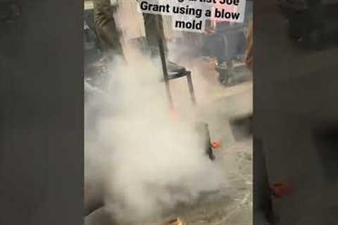 Joe Grant using a blow mold #glassblowing #art #glass  #shorts #satisfying #cool #asmr
